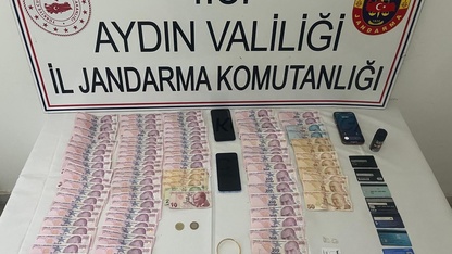 Aydın'da dolandırıcılık yaptıkları iddiasıyla 2 kişi yakalandı