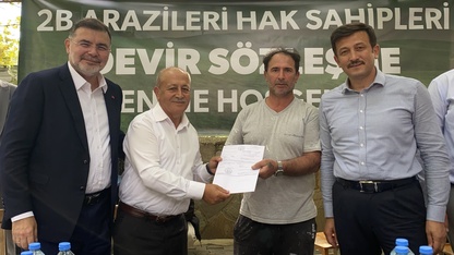 AK Parti'li Dağ, İzmir'de tapu teslim törenine katıldı